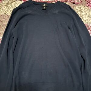 Blue Calvin Klein v neck wool cardigan.